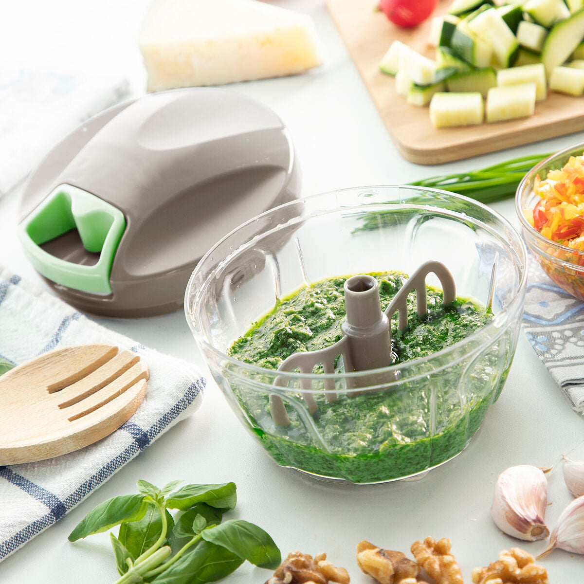 Manuaalinen minikasvisleikkuri vetonarulla Spinop InnovaGoods
