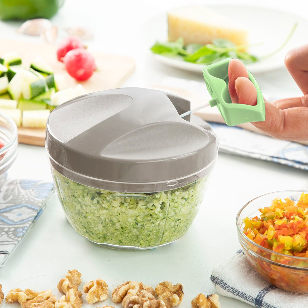 Manuaalinen minikasvisleikkuri vetonarulla Spinop InnovaGoods